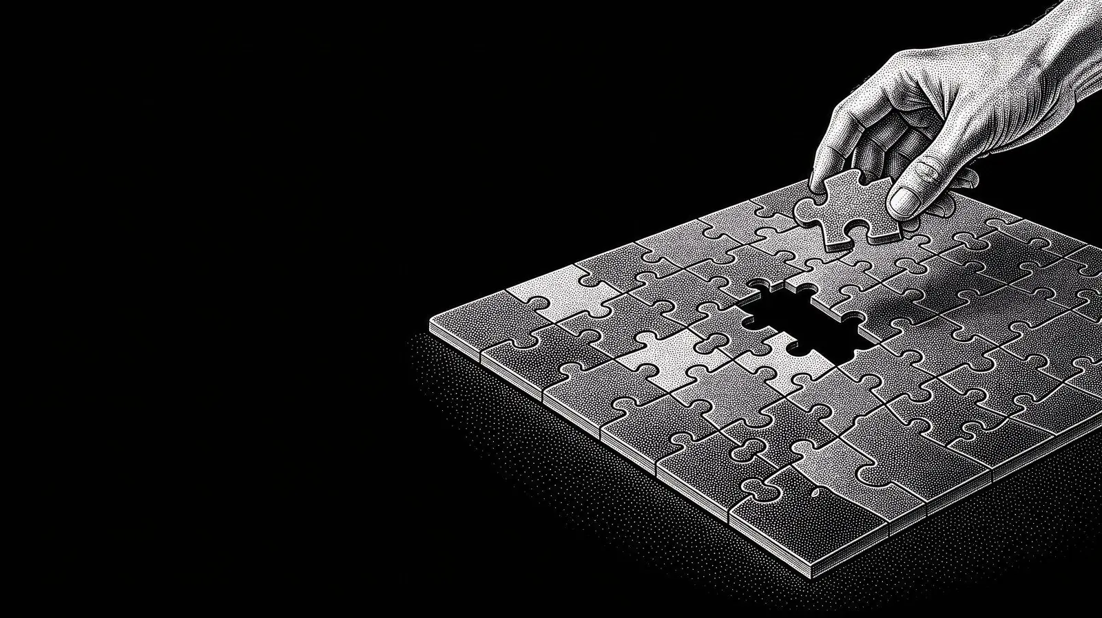 A hand placing the last piece into an almost finished board